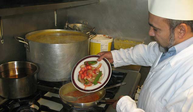 Balti Central's award winning chef seen cooking